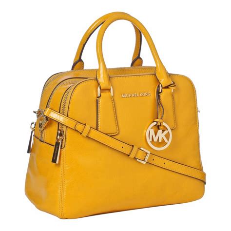 can you wash a michael kors yellow color purses bag|Michael Kors handbag cleaner.